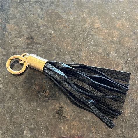 michael kors black leather tassel keychain